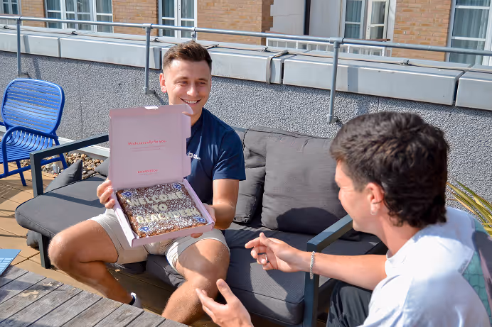 New hire opening a personalized welcome gift